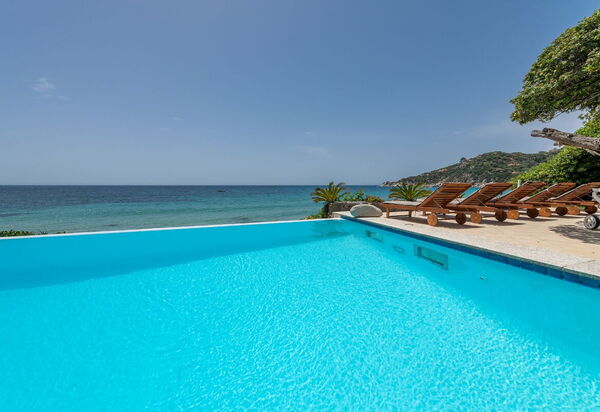 Villa Sardinia Star: Activities, Amenities, Balcony / Terrace / Patio, Building Exterior, Facilities, Garden, Main Entrance, Pool, Spring, Summer, Wellness