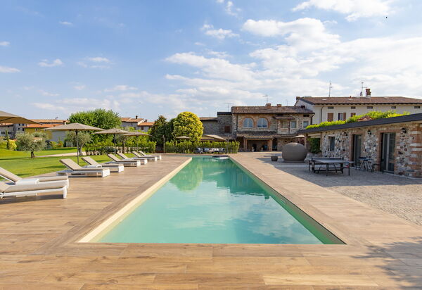Villa Mocasina: Activities, Amenities, Balcony / Terrace / Patio, Building Exterior, Golf, Pool, Spring, Summer, Wellness