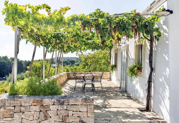 Trullo Francesca: Activities, Amenities, Balcony / Terrace / Patio, Building Exterior, Garden, Pool, Spring, Summer